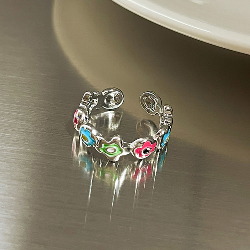 Justerbar ring med smiley face element