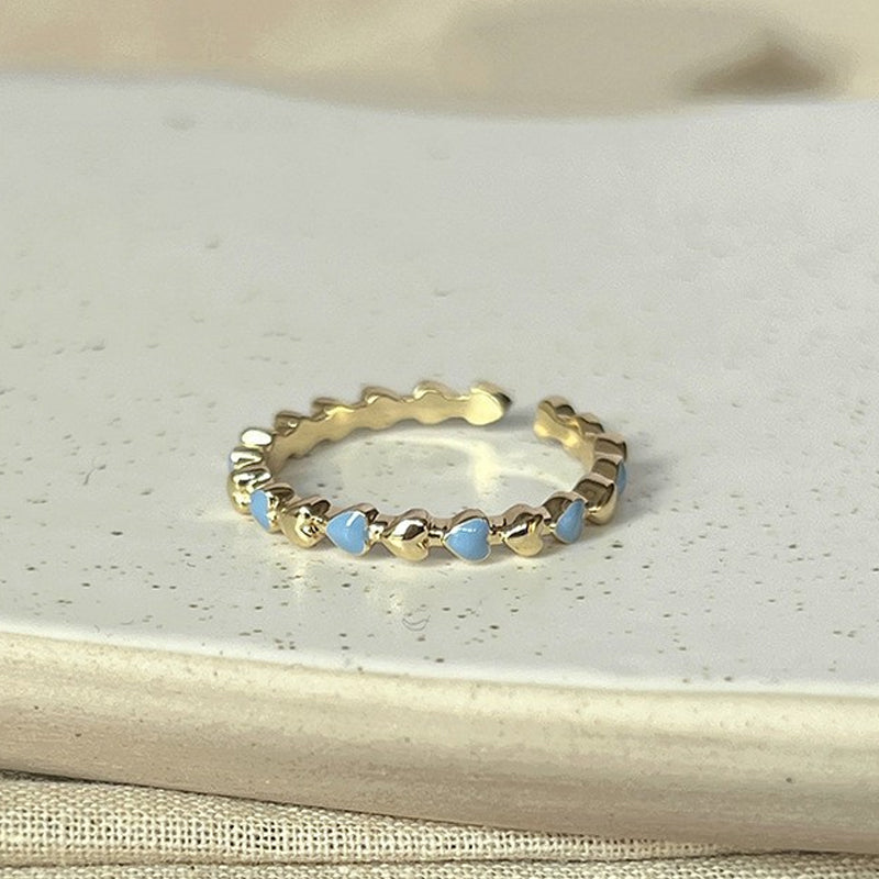 Justerbar ring med smiley face element