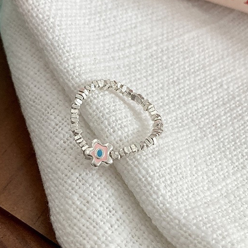 Justerbar ring med smiley face element