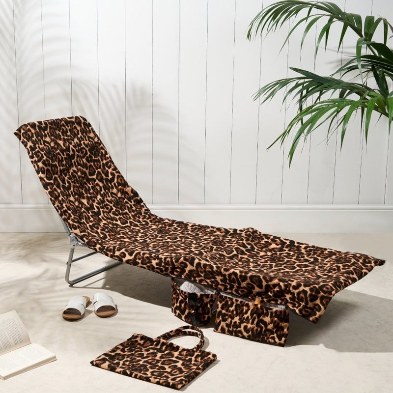 Solariumhandduk med förvaringsfack i en väska