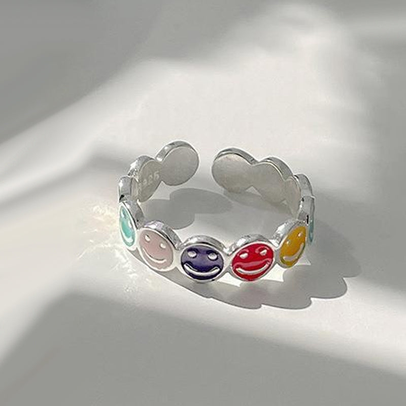 Justerbar ring med smiley face element