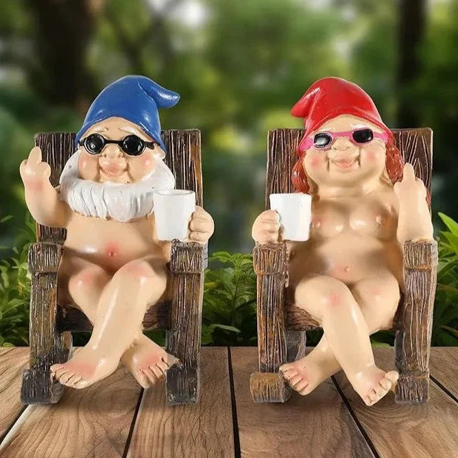 Busig trädgårdstomte Rolig staty