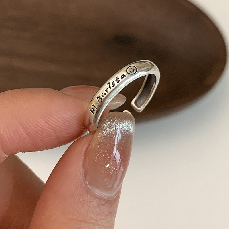 Justerbar ring med smiley face element