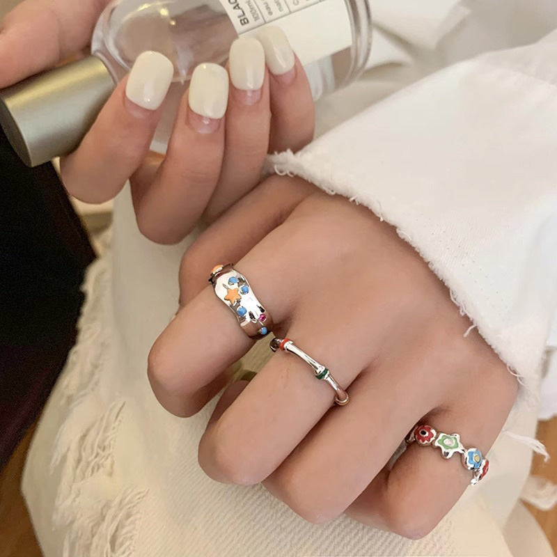 Justerbar ring med smiley face element