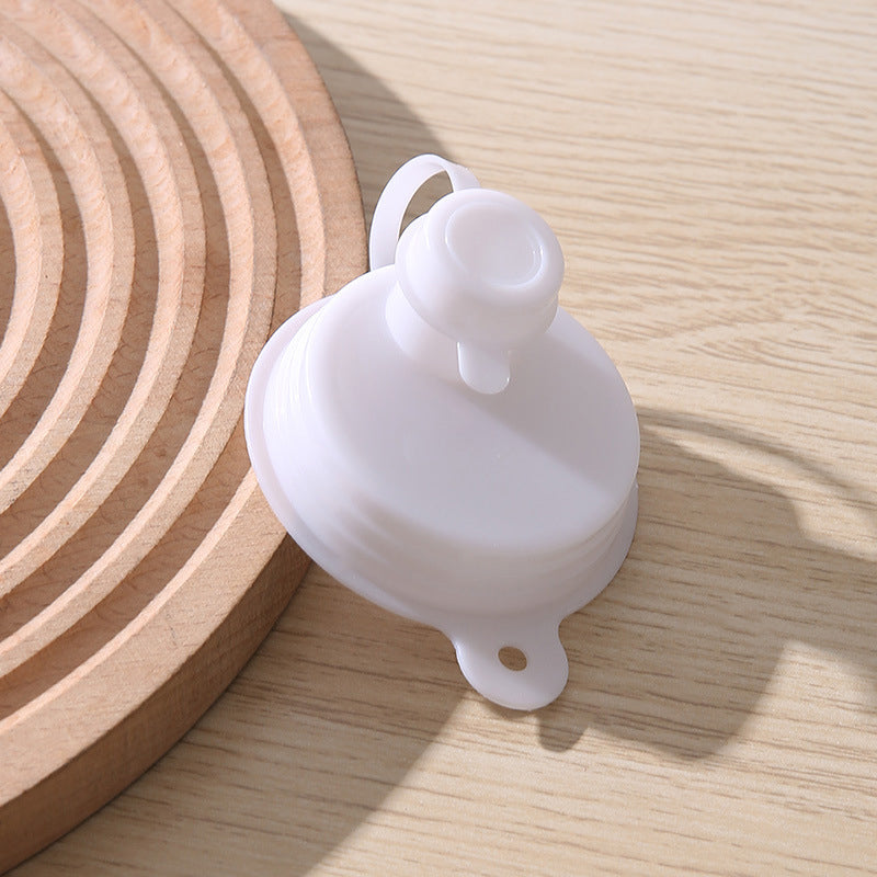 Enkelt dammskydd för burkar