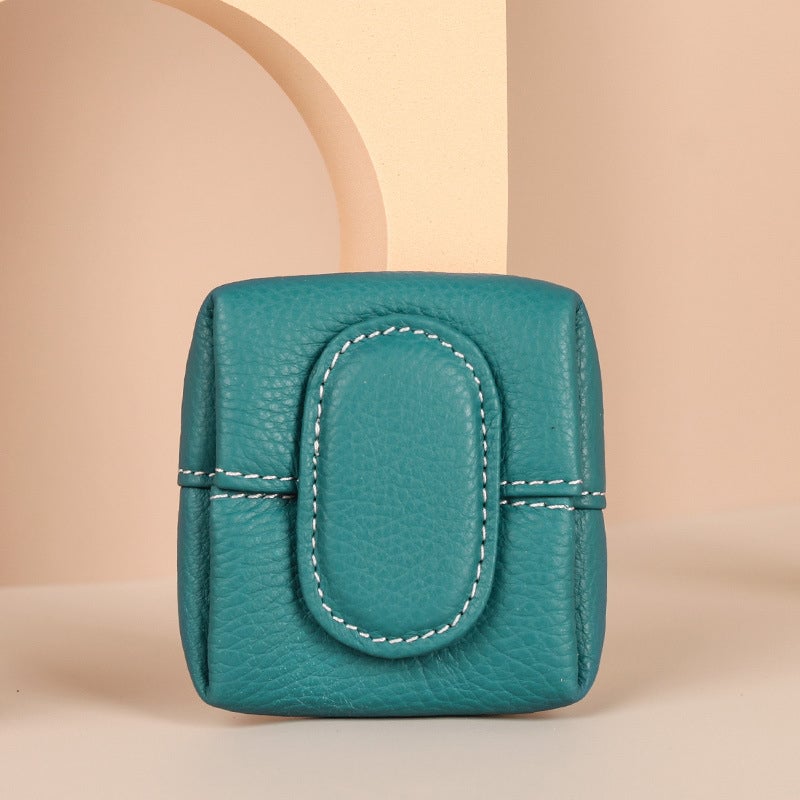 Enfärgad minimyntväska