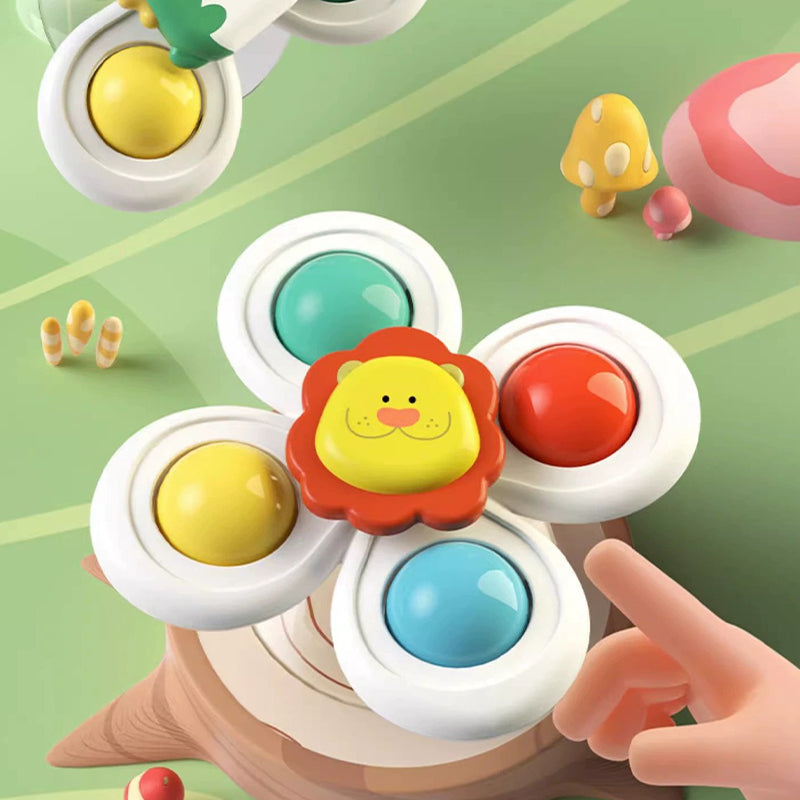 Tecknad snurrande leksak med sugkopp för barn