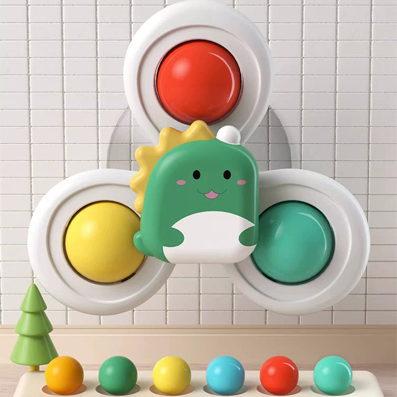 Tecknad snurrande leksak med sugkopp för barn
