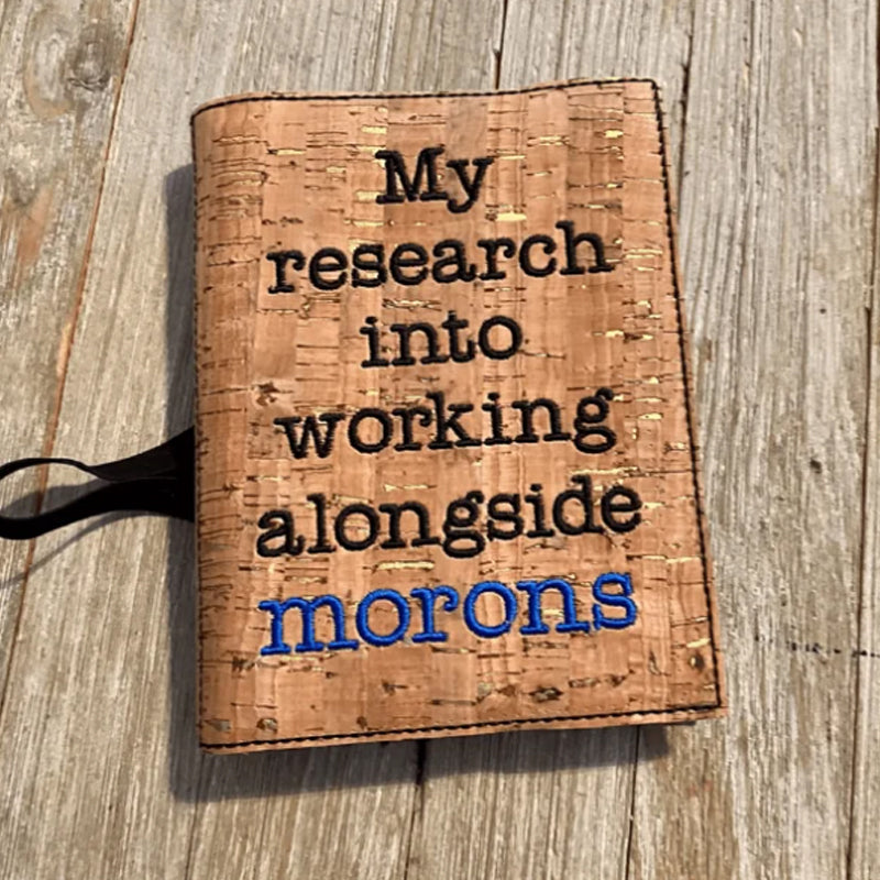 Humoristiskt anteckningsbokomslag