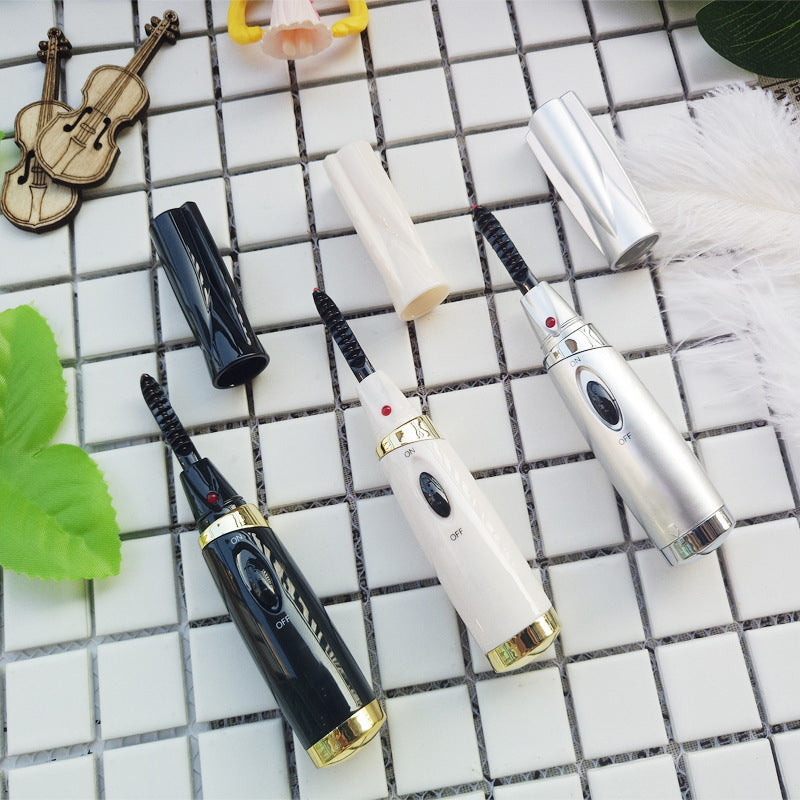 Electric eyelash curler
