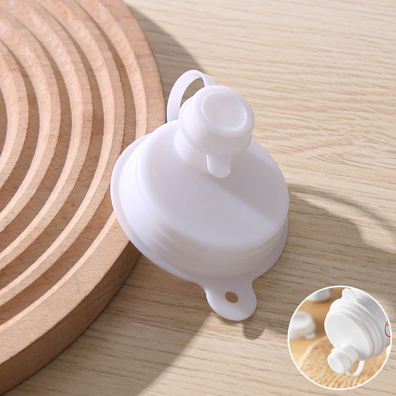 Enkelt dammskydd för burkar