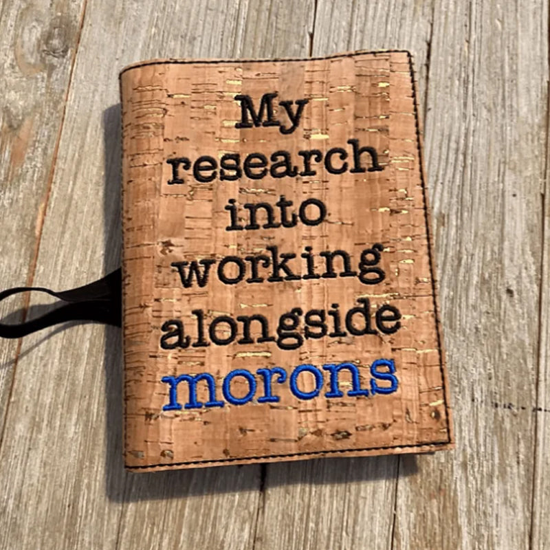 Humoristiskt anteckningsbokomslag