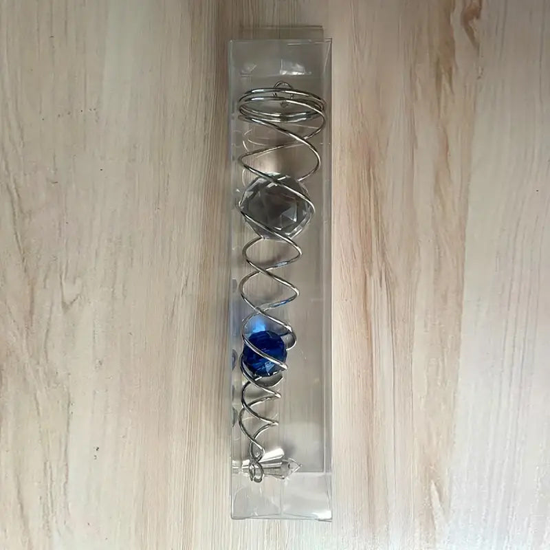 Roterande kristallvindklocka