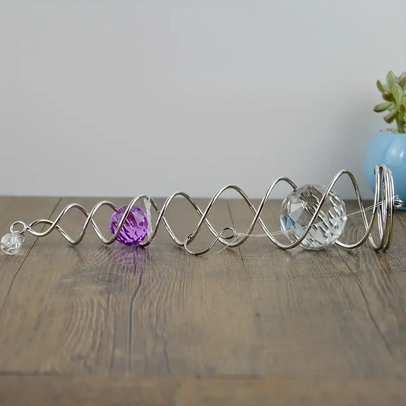 Roterande kristallvindklocka