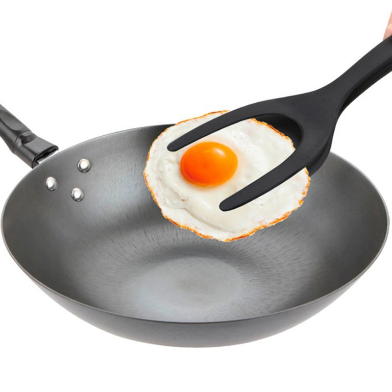 2-i-1 tånghandtag och spatel