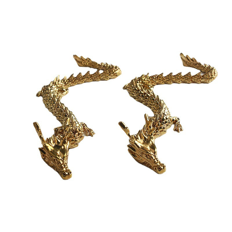 Gulddrake med rörliga leder