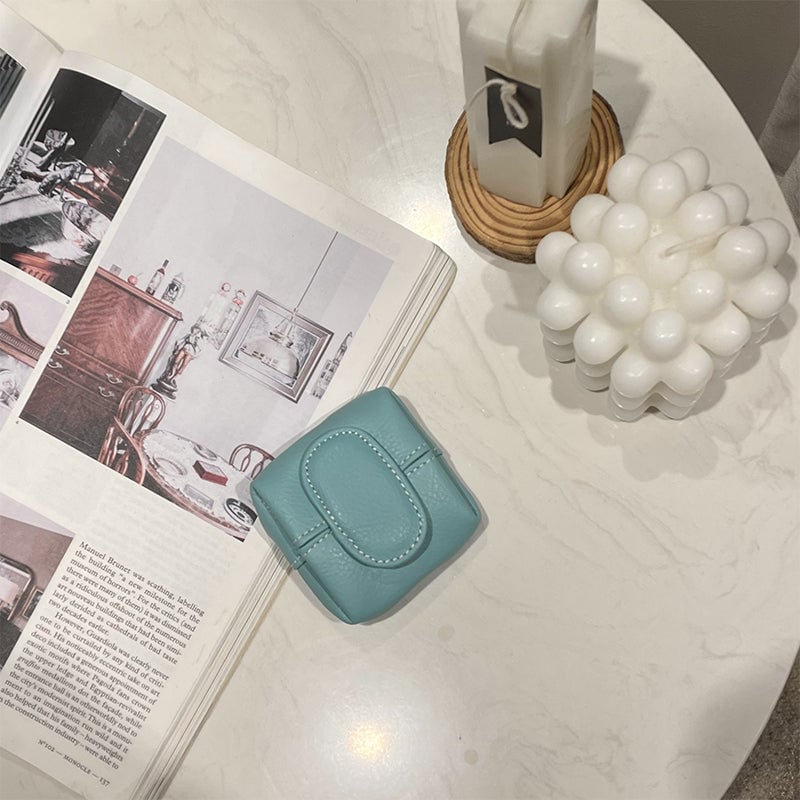 Enfärgad minimyntväska