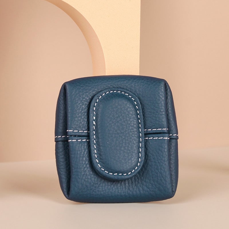 Enfärgad minimyntväska