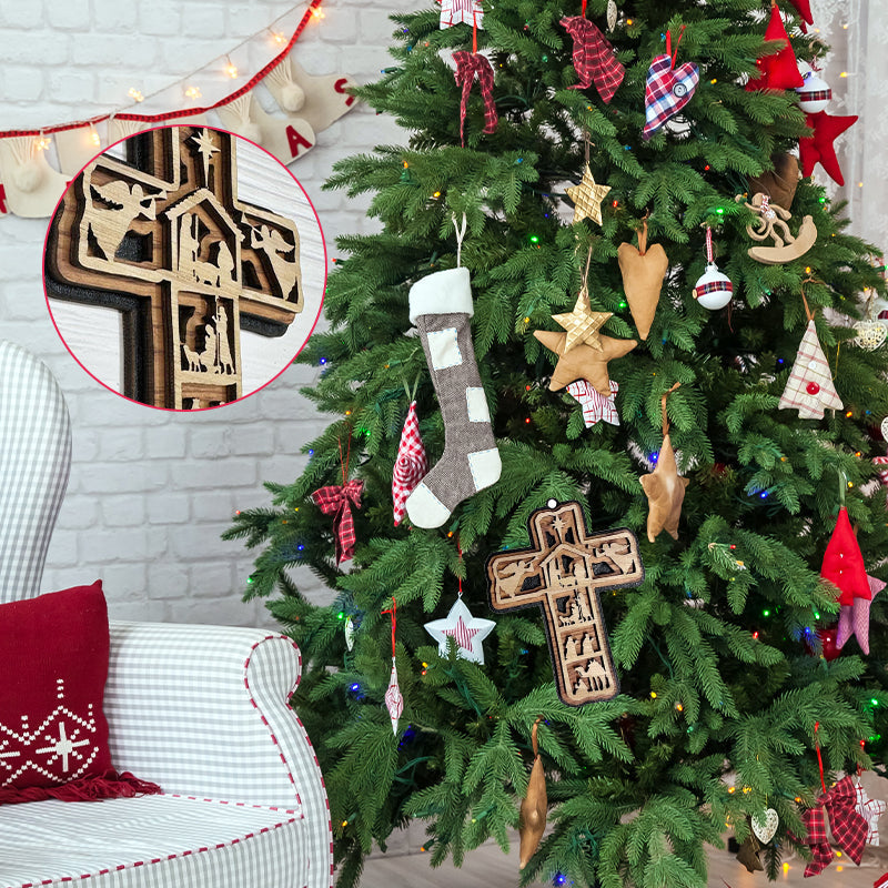 Kors med julkrubba dekoration