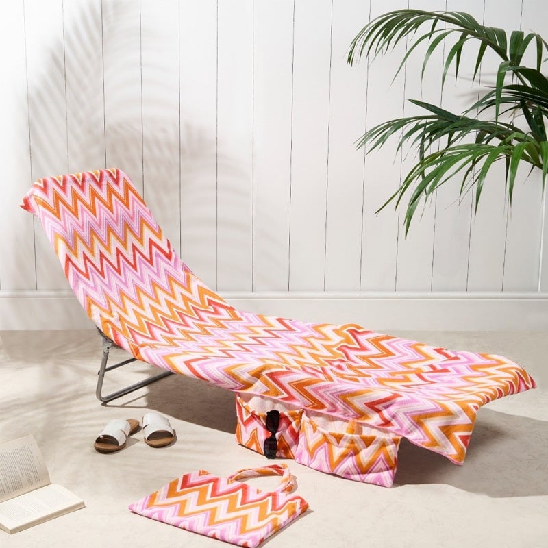 Solariumhandduk med förvaringsfack i en väska